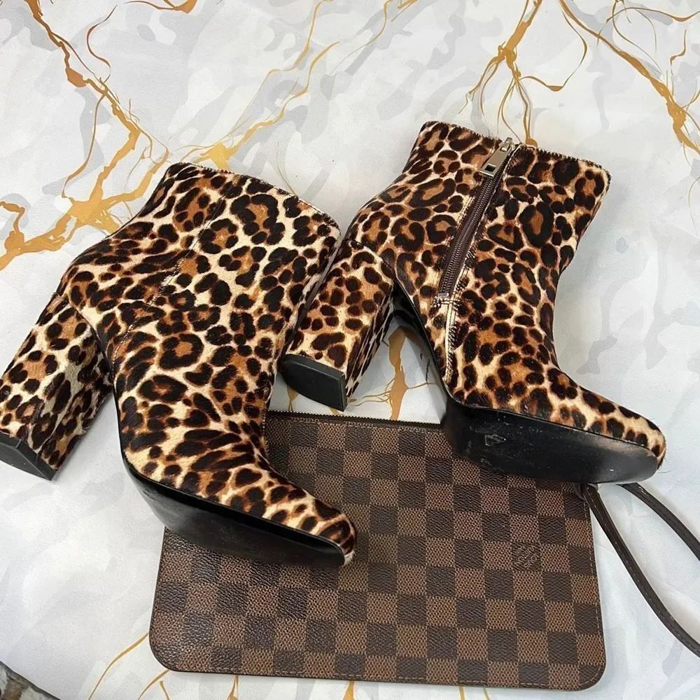 Charles David Studio leopard print calf hair ankle boots with a block heel